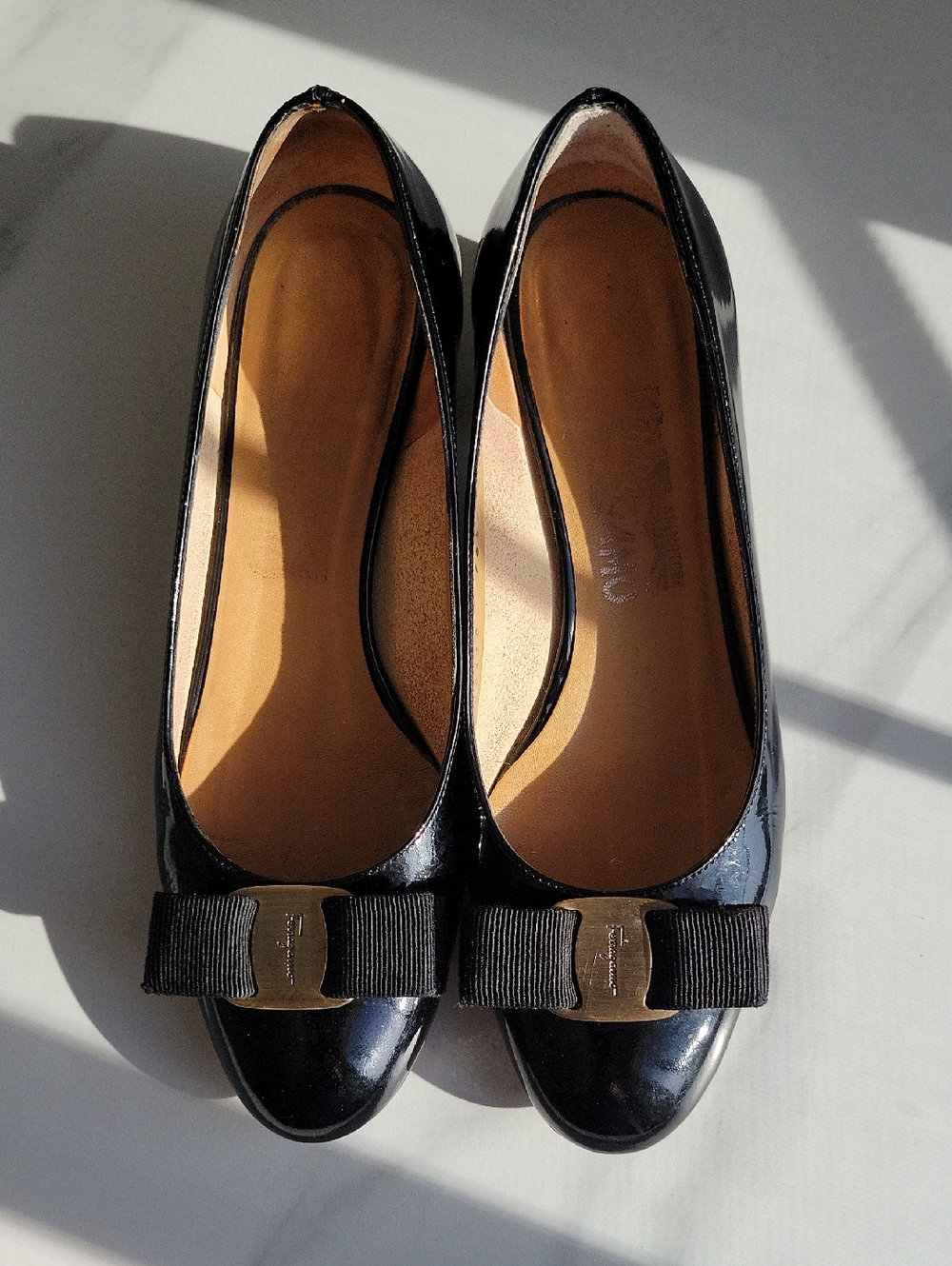 Salvatore Ferrogamo  Black Patent Bow Flats with Gold Accent